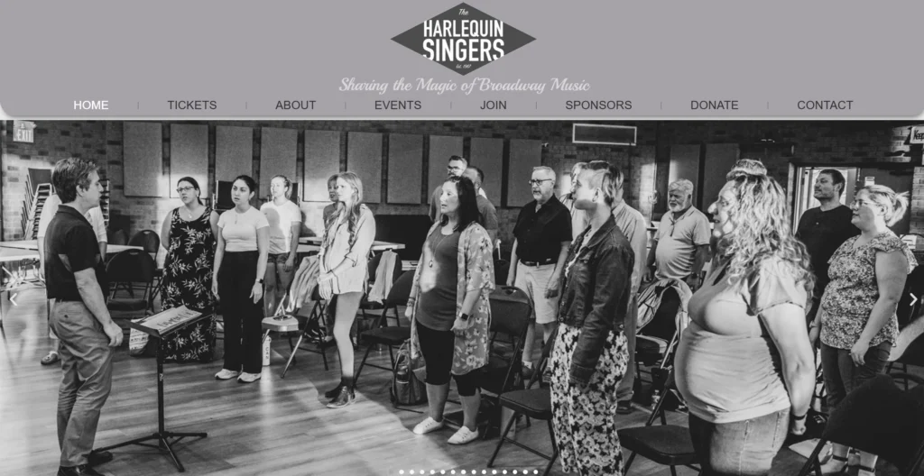 A screenshot of the front page of Harlequin Singers; a Hamilton, Ontario based community choir. Website made by Hammer and Pixel - Small Business Digital Marketing.